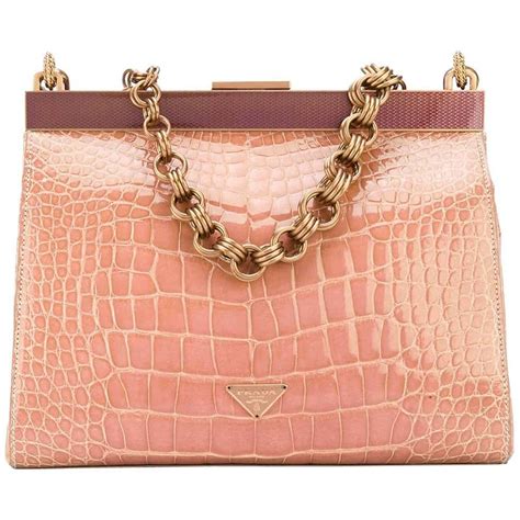 pink crocodile prada bag|Prada purse with lion.